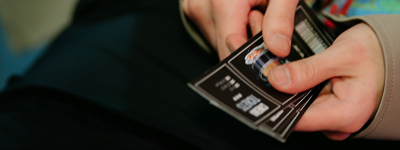 Staff scanning tickets on mobile device